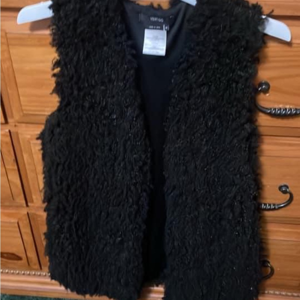 Solid black beat by Vertigo. Open front. Size Medium.